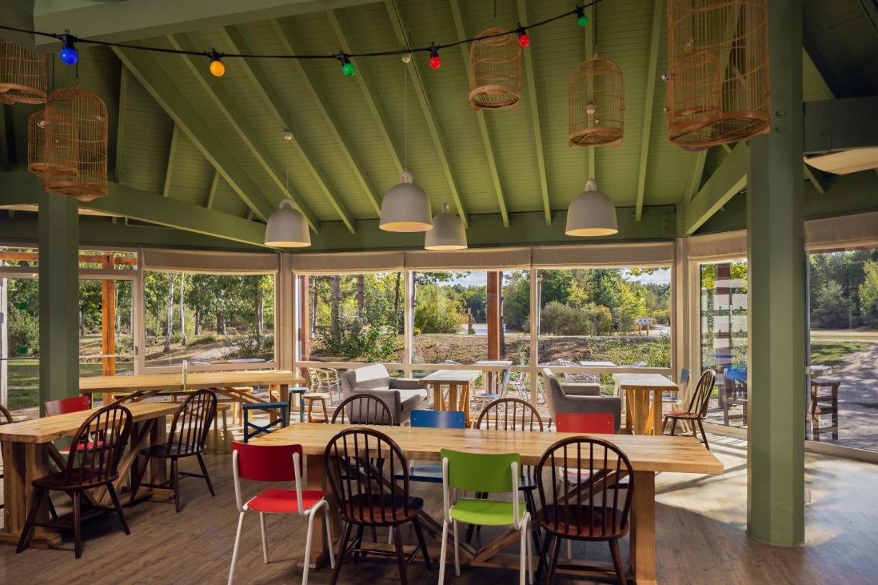 ホテル Center Parcs Les Bois Francs ヴェルヌイユ・ダヴル・エ・ディトン エクステリア 写真