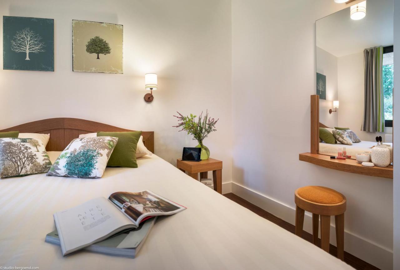 ホテル Center Parcs Les Bois Francs ヴェルヌイユ・ダヴル・エ・ディトン エクステリア 写真