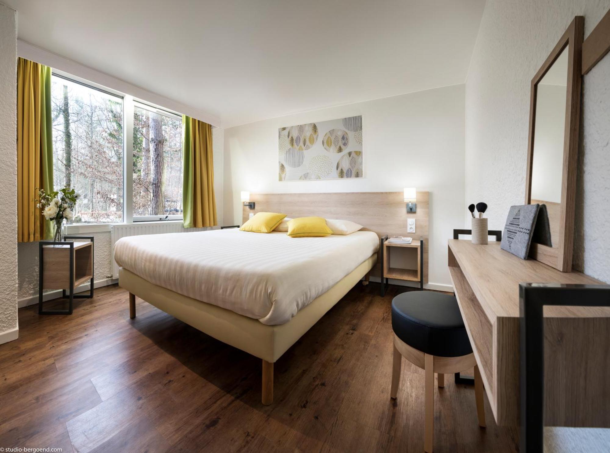ホテル Center Parcs Les Bois Francs ヴェルヌイユ・ダヴル・エ・ディトン エクステリア 写真