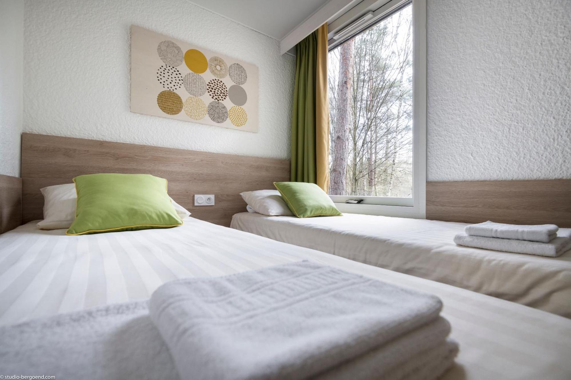 ホテル Center Parcs Les Bois Francs ヴェルヌイユ・ダヴル・エ・ディトン エクステリア 写真