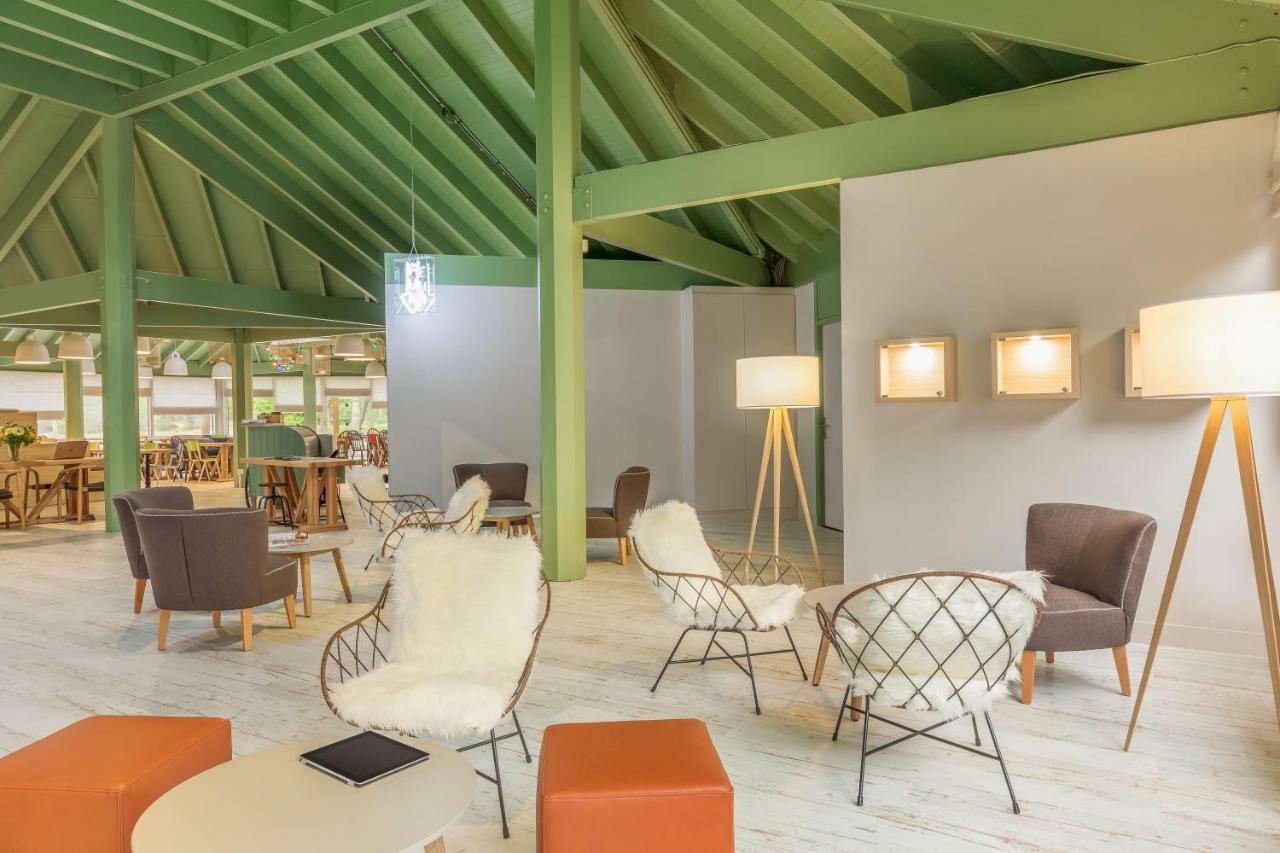 ホテル Center Parcs Les Bois Francs ヴェルヌイユ・ダヴル・エ・ディトン エクステリア 写真